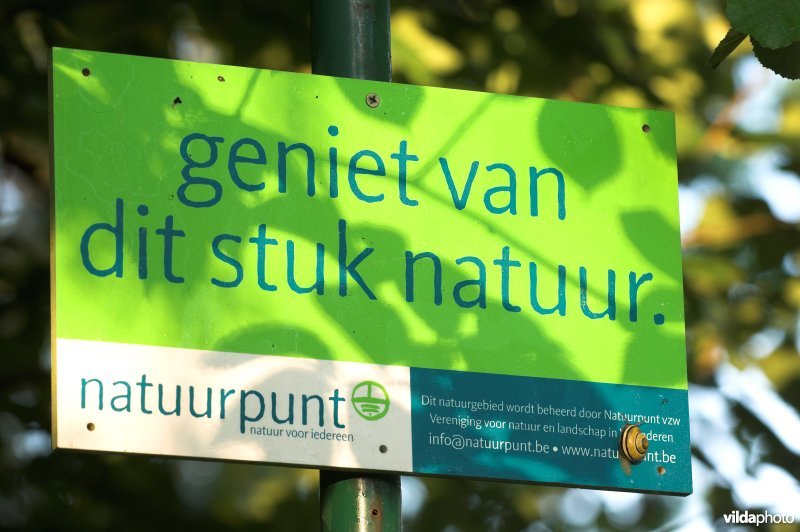 Natuurpuntbord in het natuurreservaat de Kevie